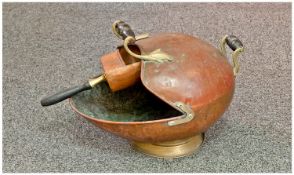 Early 20th Century Hammered Copper and Brass Mounted Coal Scuttle, with small fitted shovel .