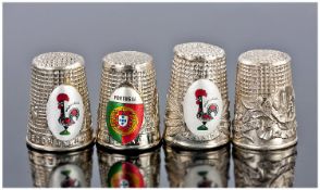 Four Portuguese Silver Thimbles. All commemorating the shrine of Freguesia De Fatima. Two enamelled