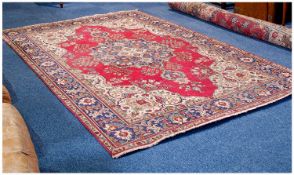 Large Room Size Woolen Rug, Mostly In Reds And Blues. 10 x 6.8 Feet