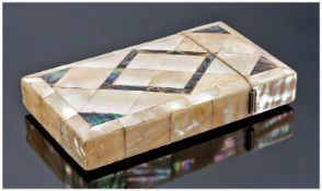 A Vintage Mother Of Pearl Hinged Lidded Case. Closed tight. Size 5.25 x 3 1/8 inches.