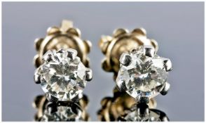 18ct White Gold Set Pair Of Diamond Stud Earrings, The round brilliant cut diamond of good colour &