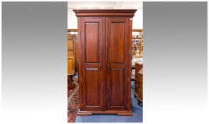 Mahogany Two Door Panelled Cupboard, with moulded cornice and panelled sides, on small bracket type