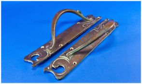 A Pair Of Art Nouveau Heavy Quality Copper Door Handles, with shaped back plates and handles of