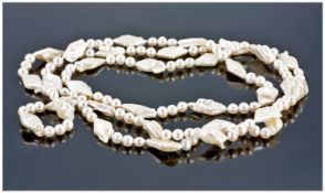Long Strand of  White Lozenge and Round Freshwater Pearls, large baroque lozenge shaped pearls
