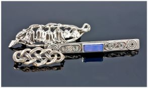 3 Silver Brooches, One With Floral Decoration, One With Celtic Knot And One Set With Amethyst