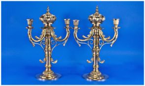 A Fine Pair Of Eastern European Brass Candlesticks With Traces Of Silvering, probably Russian. The