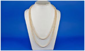 Double Strand Cultured Pearl Necklace, 7mm Pearls, Length 32 Inches.