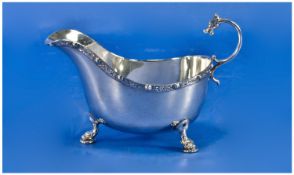 Silver Sauce Boat Of Good Quality. Raised on three snakes head feet. Hallmark Birmingham 1949. 151