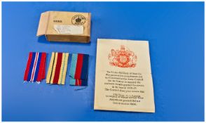 Medal Box with Ribbons and Casuality Slip to Sargent E.C.Barker.