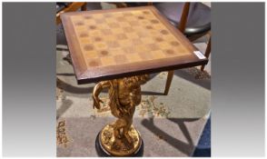 French Style Inlaid Wood Top Chess Table, supported by a gilt figure of a young girl on a gilded