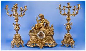 A Fine French Ornate Large and Impressive Brass Garniture Clock Set with 8 day striking movement.