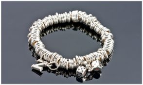 London Links Silver Bracelet loaded with 2 charms. Fully marked Links London. 63.1 grams. Excellent
