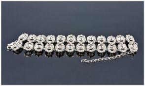 Double Row White Crystal Bracelet, each row having round Austrian white crystals framed by open