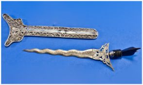 Eastern Silver Miniature Wavy Kris in Scabbard, the kris blade with pierced floral motif at the