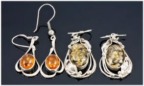 2 Pairs Of Silver Mounted Amber Set Earrings