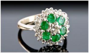 Edwardian 18ct Gold Set Diamond and Emerald Cluster Ring with flower head design. The single stone