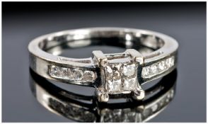 18ct White Gold Diamond Ring Set With Four Central Princess Cut Diamonds, Channel Set Diamond