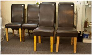 Two Pairs of Contemporary Leather Upholstered Dining Chairs, one in black and the other in dark