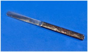 A Rare Japanese Meiji Period (1868-1912) Silver And Bronze Paper Knife. The bronze handle designed