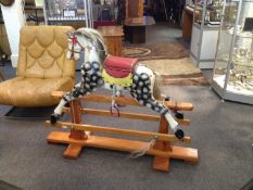 Vintage Childs Wooden Rocking Horse, in need of some repair. Black and white colourings with red