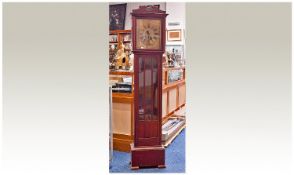 Mahogany Effect Longcase Clock, With Silvered Chapter Ring, Roman Numerals And Brass Spandrels.