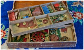 Box Of Vintage Meccano, various assorted pieces, stored within rectangular wooden box.