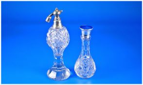 Silver Topped Perfume Bottles, 2 in total. Hallmarked Birmingham 1917. Atomiser 7 inches high.