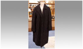 Black Persian Lamb Full Length Coat, narrow, self lined collar with revers, slit pockets, clip hook