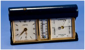 An Unusual Blue Leather and Gilt Metal Folding Travelling Combined Clock Thermometer and Barometer.