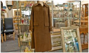 Long Ladies vintage Aquascutum Waterproof Coat size 16 to 18,  toggle fastening, fully lined. Label