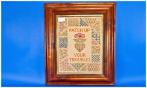 Framed Sampler `Patch Up Your Troubles`. 13 by 11 inches