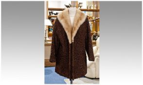 Brown Persian Lamb Long Jacket with light golden blonde mink collar, slit pockets, hook and loop