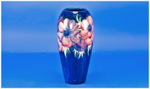 Moorcroft Elongated Ovoid Vase, `Anemone` Pattern, the large, tubelined, deep pink, blue and purple