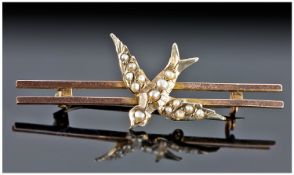 Victorian 9ct Gold and Seed Pearl Bird Brooch. 1.75 inches wide. Marked 9ct, boxed.