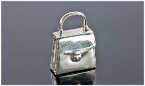 Tiffany & Co. Vintage and Rare Miniature Silver Pill Box in the form of a ladies hand bag. Marked