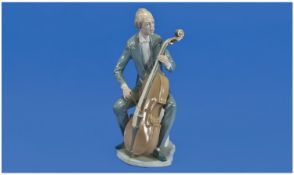 Lladro Figure `Cellist`. Model number 4351. Issued 1969, last year 1978. Height 12.5 inches. Mint