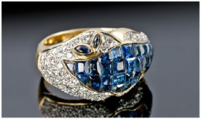 18ct Gold Diamond And Sapphire Dress Ring Mounted With Calibre Cut Sapphires (One Missing)