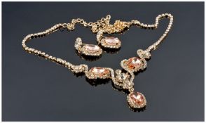 Peach Pink and White Crystal Necklace and Earring Set, the necklace having two of the oval faceted
