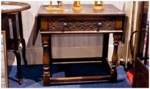 Heavy Antique Type Carved Oak Drop Leaf Sides Serving Table, in the Jacobean style with carved draw
