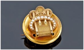 Victorian Fine Gold and Seed Pearl Buckle Brooch with Safety Chain. 1.25 inches high. Tests high ct