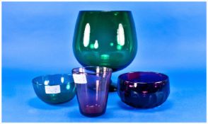 Four Pieces Of Coloured Glass. Comprises large green oversized goblet shaped vase, Swedish Reijmyre
