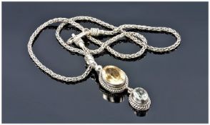 Silver Stone Set Pendant In A Rope Twist Border Suspended On A 16 Inch Fancy Link Silver Chain