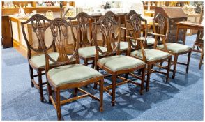 A Good Set Of 20th Century Oak Dining Chairs In The George III Style. Comprises 2 carvers and 6