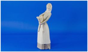 Lladro Figure Girl with Lamb. Model number 4584, issued 1969. Height 10.5 inches. Excellent