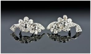 A Pair Of 18ct White Gold Set Diamond Drop Earrings Marked 750. Est 1.5cts.