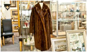 Three Quarter Length Dark Brown Mink Coat, fully lined. Approx size 14-16