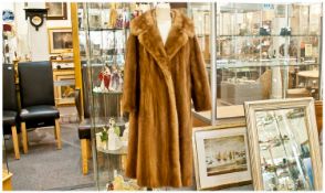 Three Quarter Length Mid Brown Mink Coat, fully lined. Approx size 14-16