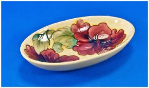 Moorcroft Deep Boat Shaped Bowl `Hibiscus` Design, on yellow ground. 9 inches in length.