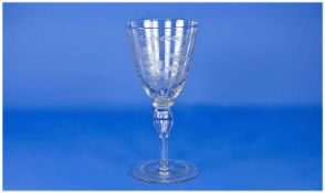 A 19th Century Wine Glass with etched leaf decoration to bowl & date 1888. Stands 7`` in height.