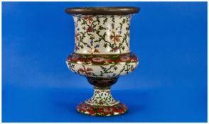 A German Type Urn Shaped Vase stamped to the base `AWN 293` Decorated with floral designs on a